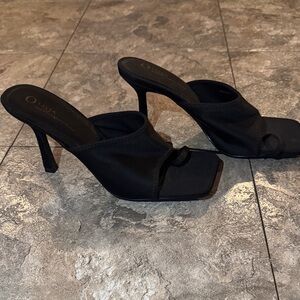 Elegant Black Mules by Oliva